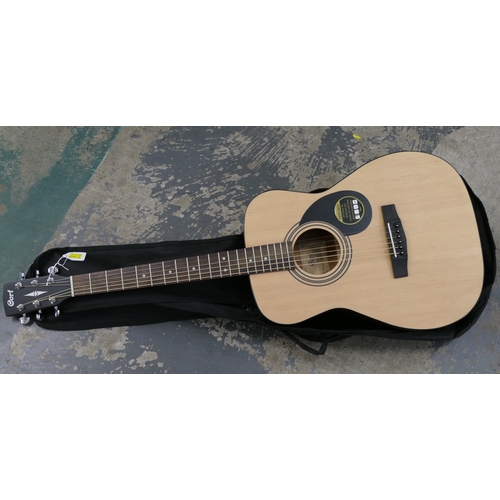 181 - A Cort model AF510 acoustic guitar in soft case