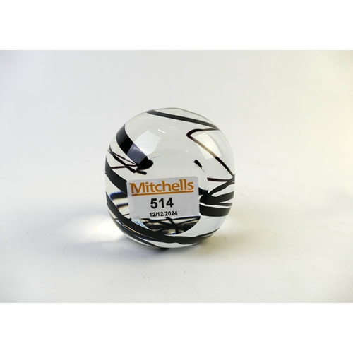 514 - Glass paperweight with black swirl decoration, indistinct marks to base