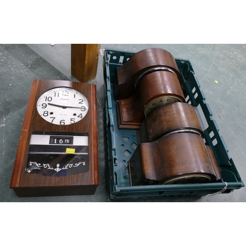 112 - A Rhythm 30 day wall clock and a box of  four wooden mantle clocks