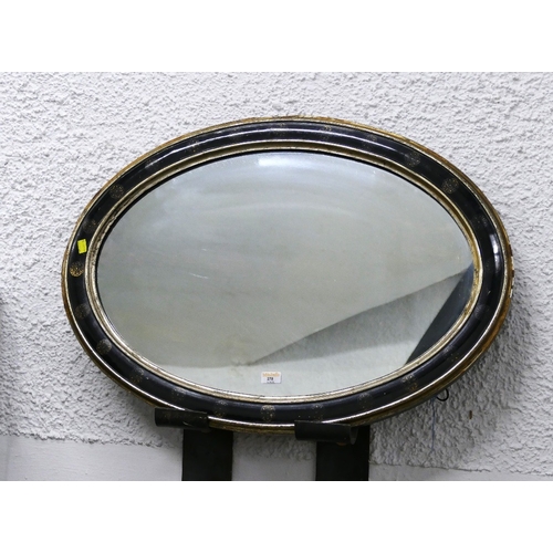 278 - Oval wall mirror in black decorated frame