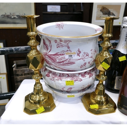 398 - Two floral chamber pots, ceramic bowl a pair of brass candlesticks