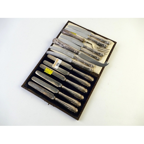 534 - Cased set of six silver handled butter knives with stainless steel blades and another eight pieces o... 