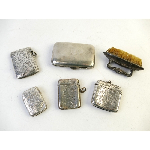 538 - Four hallmarked Vesta cases +/- 95 grams, silver topped nail brush and silver coated cigarette case