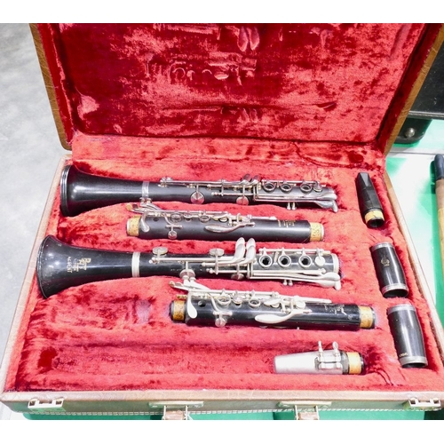 62 - Case containing parts of two Boosey & Hawkes Regency clarinets, Emperor and Regent with mouth pi... 