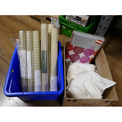 101 - Two boxes of fabric, bedding, rolls of wallpaper including Laura Ashley