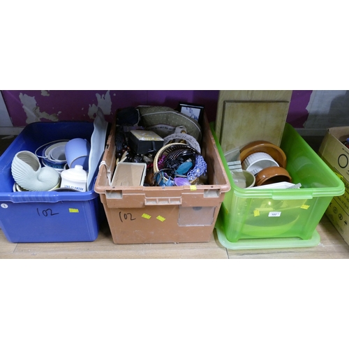 102 - Three boxes of plant pots, kitchenware, chopping boards, costume jewellery, mugs etc