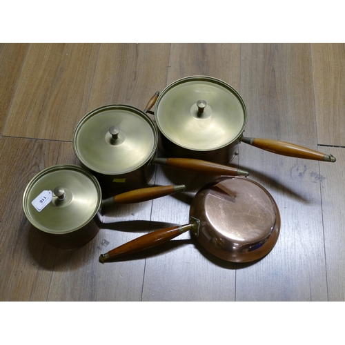 116 - Four copper and brass saucepans and frying pan