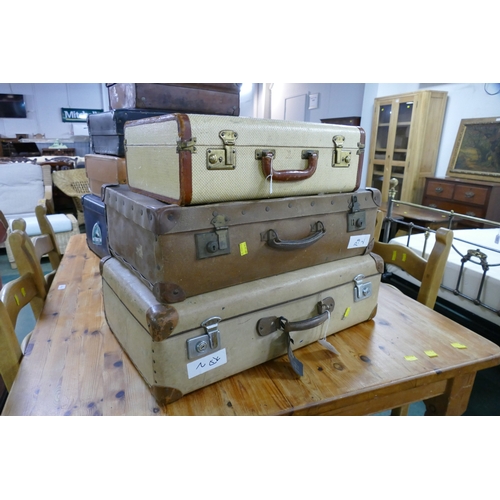 13 - Three vintage suitcases