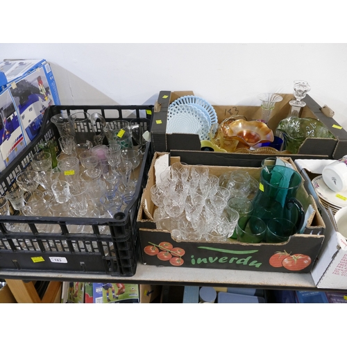 183 - Three boxes of glassware, coloured glass, carnival glass and blue Vaseline lattice basket plates