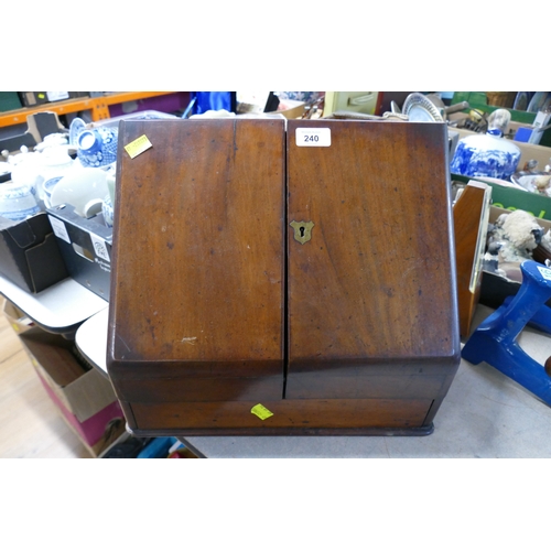 240 - Mahogany desk top letter rack with integrated inkwells