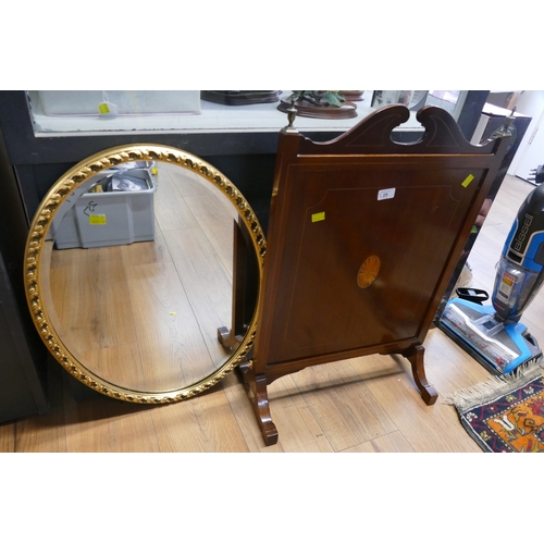 29 - Mahogany inlaid firescreen and oval wall mirror