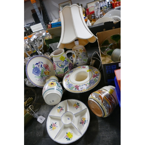 341 - Poole pottery handpainted floral ceramics, jugs and lamp base