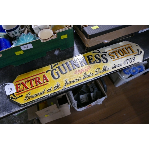 343 - Reproduction cast metal advertising sign for Guinness Extra Stout