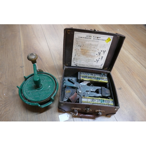 42 - Antique Bono No 2 knife cleaner, suitcase and antique ear tattooing kit