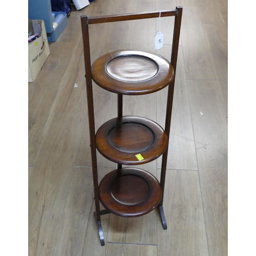 67 - Folding three tier mahogany cake stand