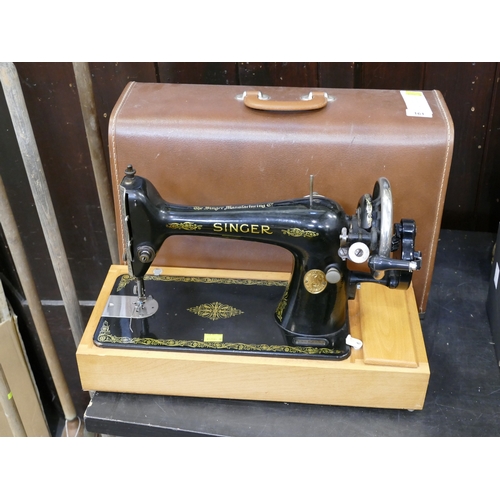 161 - Singer hand cranked sewing machine in leather case