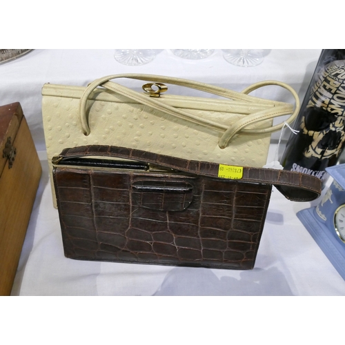 332 - Two vintage skin ladies handbags