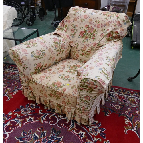 599 - Floral upholstered wing armchair