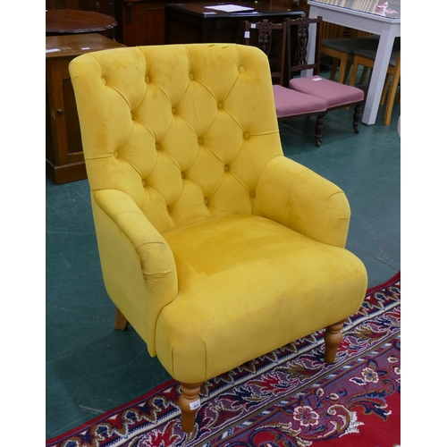 600 - Retro style mustard colour wing deep button armchair