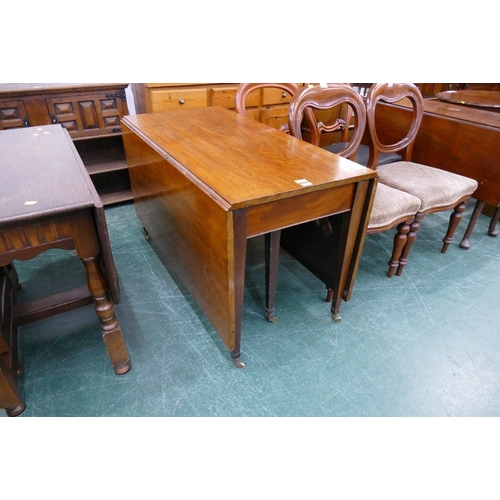 559 - Victorian mahogany twin drop flap table on tapered legs