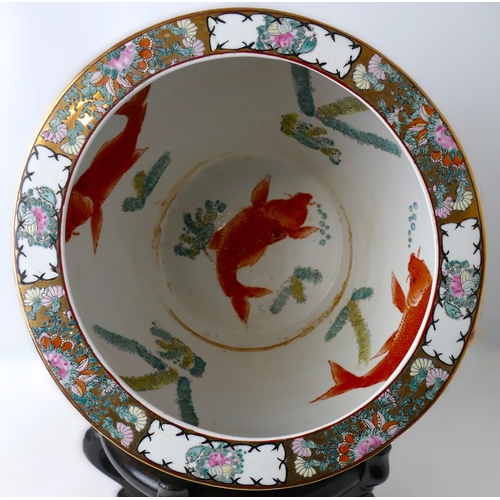 1 - Oriental porcelain large jardiniere Koi fishbowl, 16 cm with a wooden stand.