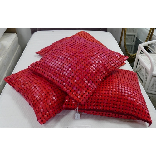 17 - Five red cushions with button detail