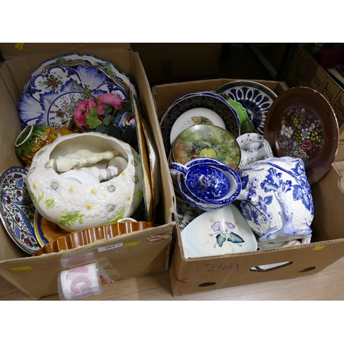 264 - Two boxes of decorative plates, ceramics, ornaments, vases, etc