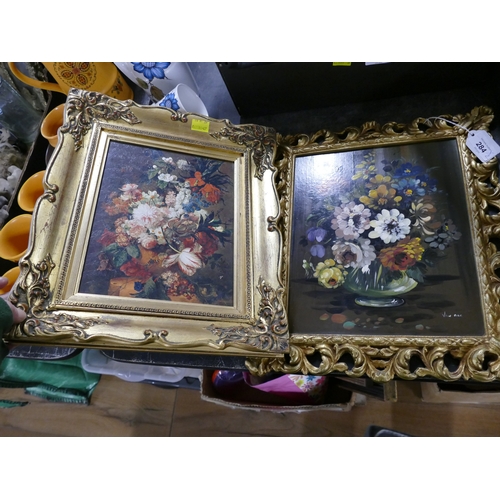 284 - Two traditional style framed pictures of flowers in gold coloured frames