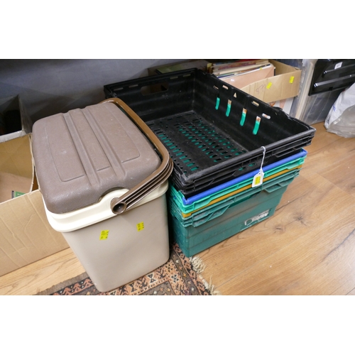 86 - Three plastic storage crates and cool box