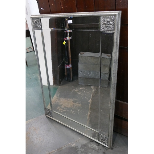 165 - Large wall mirror in ornate silver coloured frame