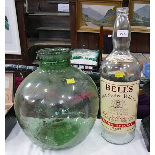 227 - Large Bells Scotch Whisky empty bottle and green carboy