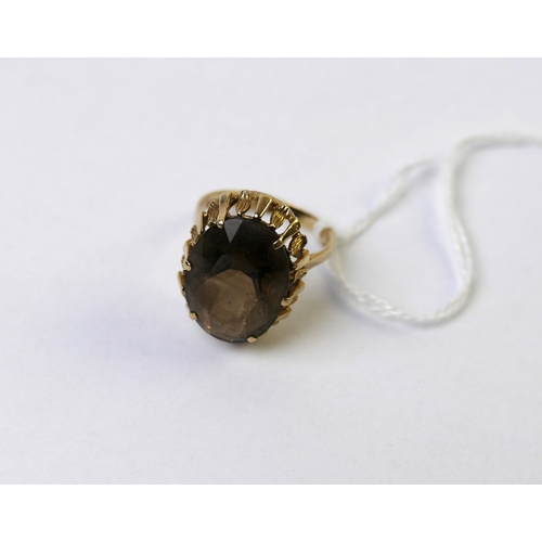 335 - 9ct gold ring  smoky quartz stone, 5 grams