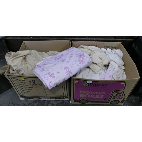 138 - Two boxes of bedding - pink children's bedding etc