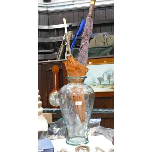 282 - Large glass vase or stick stand with two vintage umbrellas