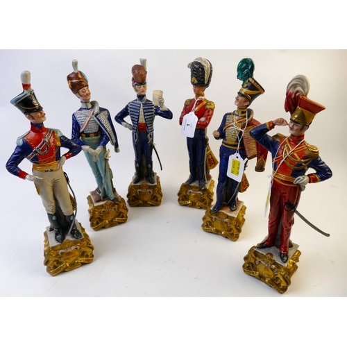 1 - Ten Capodimonte porcelain soldier figures, 30 cm high, and similar female figure