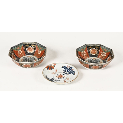 34 - A pair of Imari octagonal bowls.  Height 8.5 cm, diameter 24 cm, together with a floral patterned di... 