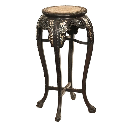 41 - An Asian hardwood marble and mother of pearl inlaid jardiniere stand.  Height 91 cm, top diameter 38... 