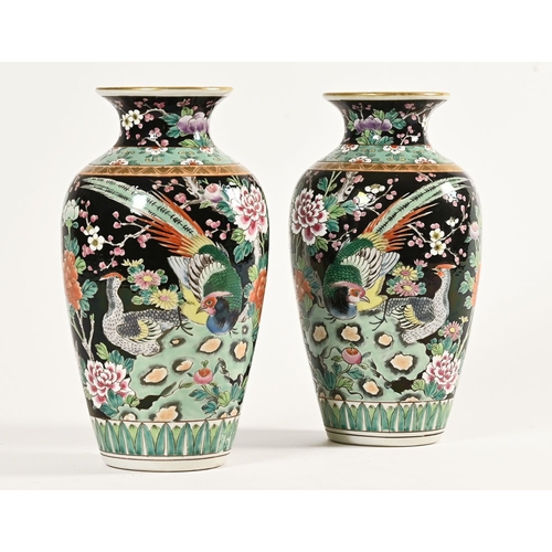 52 - A pair of famille noire vases, decorated with Pheasants, flowers etc, with character marks to the ba... 