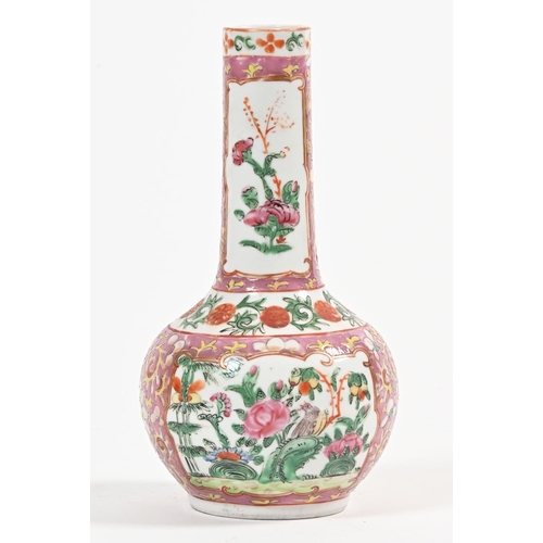 56 - A famille rose bottle jar, decorated with birds and floral sprays.  Height 21.5 cm.