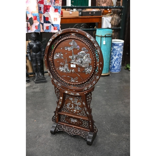 38 - A Chinese hardwood inlaid mother of pearl table screen. Height 85 cm, top diameter 46 cm.