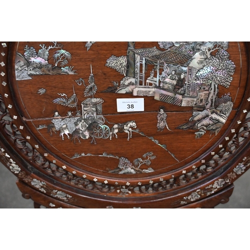 38 - A Chinese hardwood inlaid mother of pearl table screen. Height 85 cm, top diameter 46 cm.