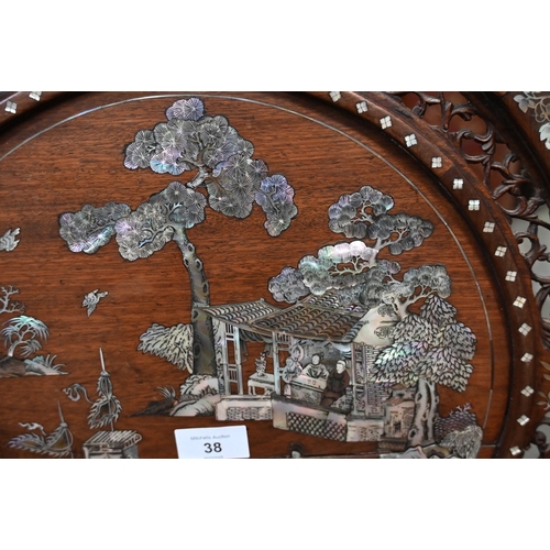 38 - A Chinese hardwood inlaid mother of pearl table screen. Height 85 cm, top diameter 46 cm.