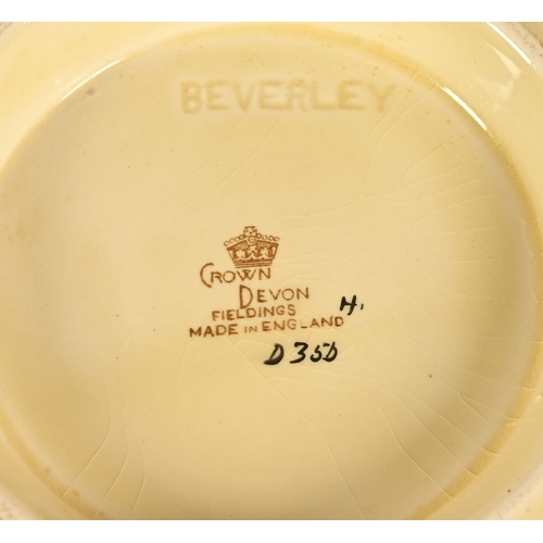 121 - Seventeen pieces of Crown Devon Fieldings dinnerware, comprising 3 ashettes, 2 lidded tureens and 12... 