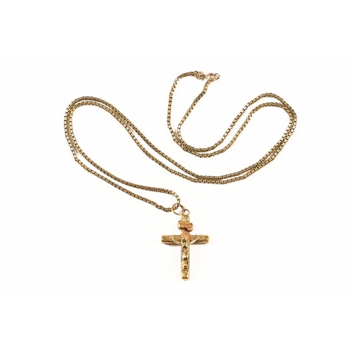 330 - A 9 ct gold chain, with crucifix pendant (loop stamped 375, crucifix unmarked).  7.8 grams.