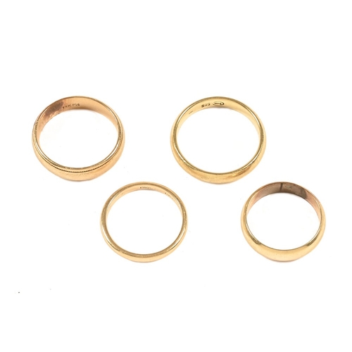 357 - Three 14 ct gold wedding bands, and a yellow metal wedding band.  18 grams.