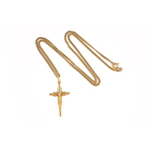 389 - An 18 ct gold chain with 18 ct gold cross pendant. 15.5 grams.
