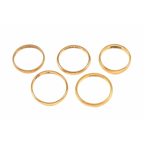 401 - Five 22 ct gold wedding bands. 12.8 grams.