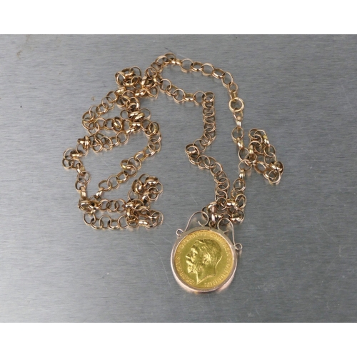 3 - George V 1914 half sovereign in 9 ct gold mount on24 ins 9 ct gold chain, gross weight 12.8 grams
