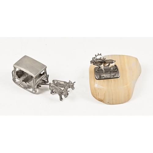 414 - A miniature hallmarked silver stag, together with an Indian silver coloured Bullock cart. Cart overa... 