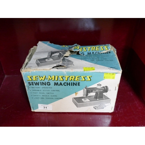 31 - Boxed Sew Mistress sewing machine, toy size